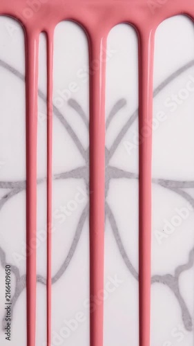 Vertical Pink Paint Drips Over a Minimalist Butterfly Outline on a White Surface Artistic Backdrop