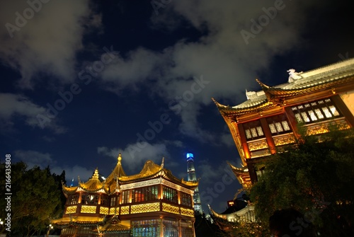 Photography Traditional Chinese temple architecture in Yu Garden illuminated at night with m