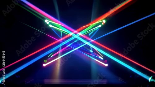 Abstract neon light trails forming geometric patterns in dark space