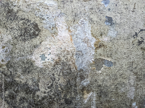 Weathered concrete wall with peeling paint industrial texture surface