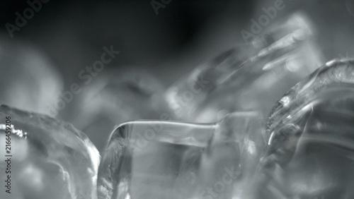 Obraz na plátně Ice cubes up close with a soft focus, creating an abstract background of cold, c