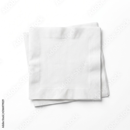Stack of blank white folded paper napkins isolated on white background