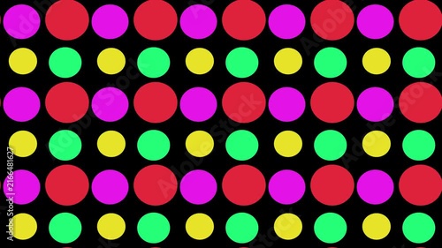 Vibrant Multicolored Geometric Polka Dot Pattern Design on Dark Background 4k Motion Loop