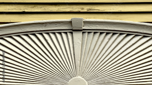 Elliptical Sunburst Pediment with Central Keystone Block