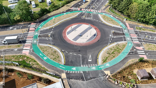 Aerial view of the Dutch Roundabout featuring dedicated green cycle lanes, road markings, and pedestrian crossings in Hemel Hempstead, England, United Kingdom.