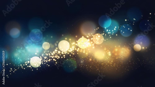 Beautiful glowing abstract lights with bokeh effect and sparkling particles on dark background