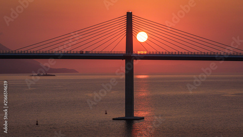 Peljesac Bridge over Adriatic Sea at sunset
