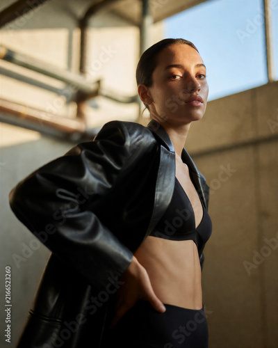 Fashion Portrait of a Model in a Modern Industrial Setting