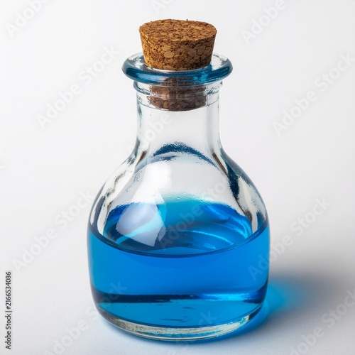 Glass bottle with blue liquid and cork stopper on white