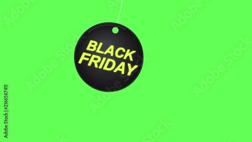 Black Friday sale promotion with hanging tag on bright green background