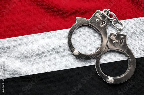 Konstfotografi Flag of Yemen and police handcuffs