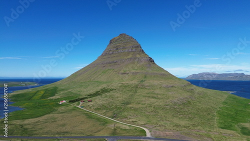 Kirkjufellsfoss Waterfall and Kirkjufell Mountain in Iceland