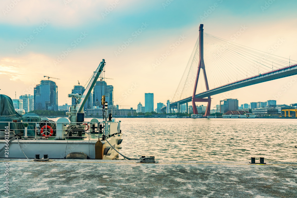 Obraz premium The skyline of Shanghai, China and the beautiful scenery of Yangpu Bridge and Huangpu River