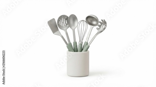 A modern set of stainless steel kitchen utensils with pastel green handles, organized in a sleek white ceramic holder against a clean white background