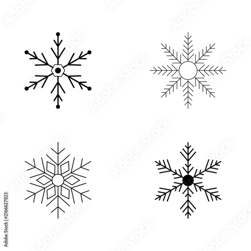 Set of four black snowflake designs in a vector illustration, featuring varied geometric patterns isolated on a white background