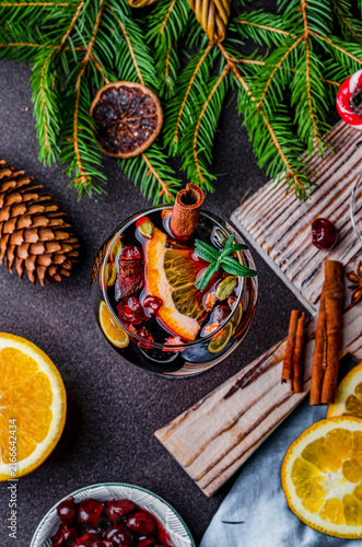 Festive Mulled Wine with Orange Slices and Christmas Tree