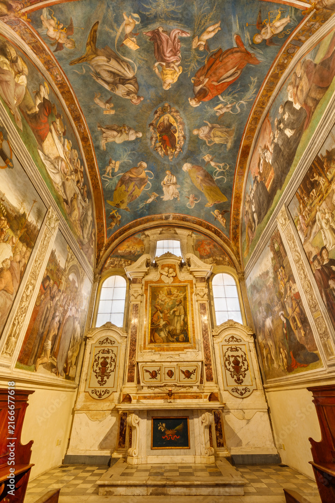 Naklejka premium LUCCA, ITALY - JUNE 23, 2026: The chapell Cappella della Croce the church Basilica di San Frediano with the frescoes by Amico Aspertini (1508 - 1509).
