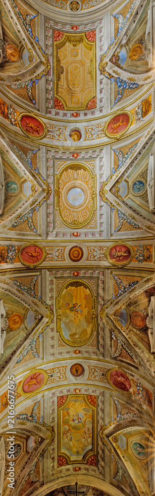 Naklejka premium LUCCA, ITALY - JUNE 23, 2026: The fresco of ceiling in Cappella del Soccorso in the church Basilica di San Frediano by unknown baroque artist.