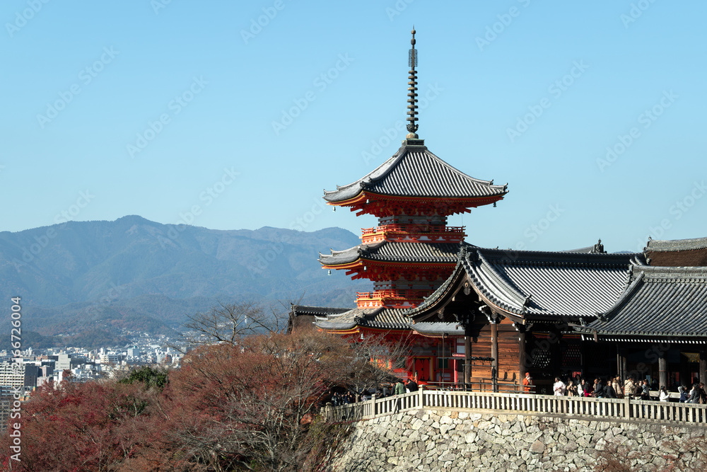 Naklejka premium Authentic Kiyomizu-dera Temple Three-Story Pagoda with Autumn Leaves in Early December, Kyoto