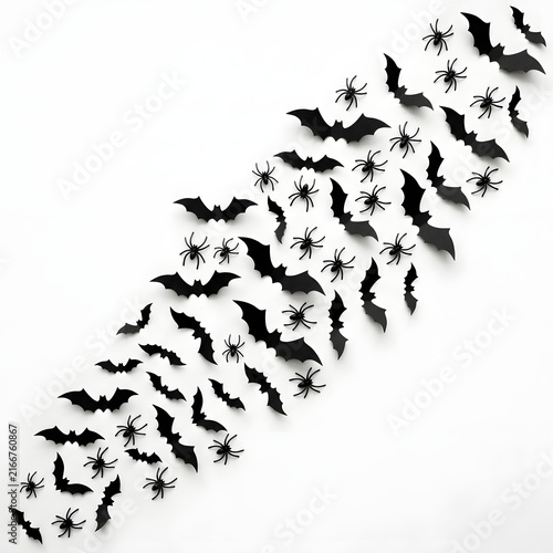 Black paper bats and spiders for halloween decorations
