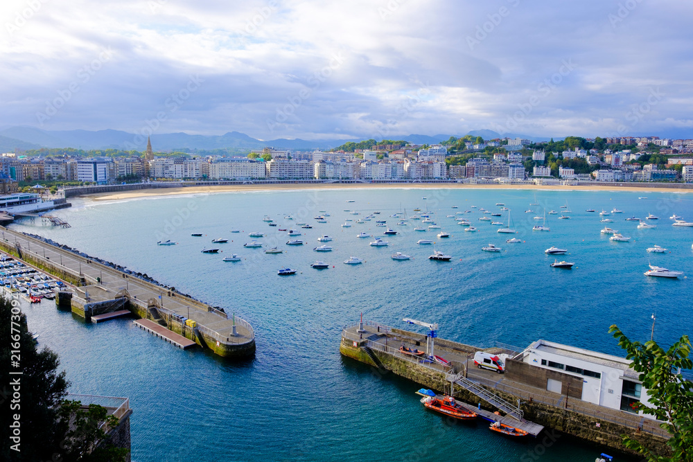 Fototapeta premium La Concha Bay and Harbor in San Sebastian at Night, Basque Country, Spain