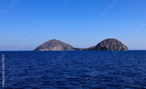 Fotografie Volcanic islands of Santorini caldera viewed from the sea, Greece