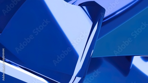 Modern geometric chrome glass building exterior with sharp blue reflections and futuristic architecture design