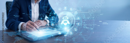 Konstfotografi Engineer using a tablet to control Robotics units