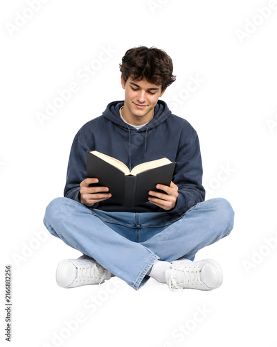 Isolated A Student Sitting Cross-Legged Reading A Book isolated cutout on transparent background