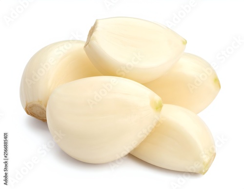 Peeled garlic cloves isolated on white background.