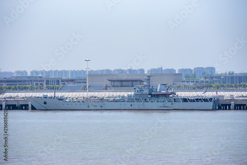 Photography Chinese naval vessel docked along the Yangtze River near Shanghai, showcasing China's modern maritime and military presence