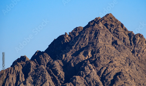 Fotografía Rugged mountain peak under clear blue sky during daylight