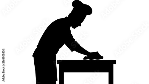 Chef silhouette working at table white background.