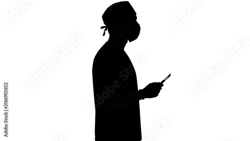 Silhouette of person using smartphone white background.