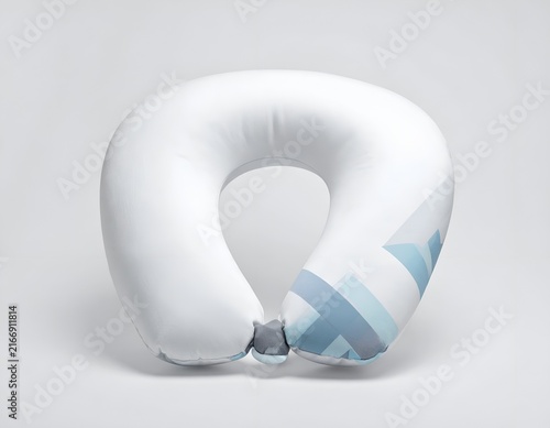 White travel neck pillow with blue geometric pattern