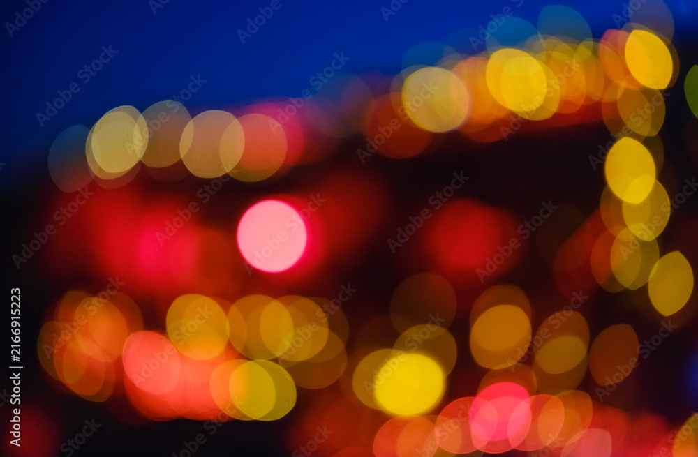 Fototapeta premium Abstract colorful night bokeh lights with soft focus and glowing effect