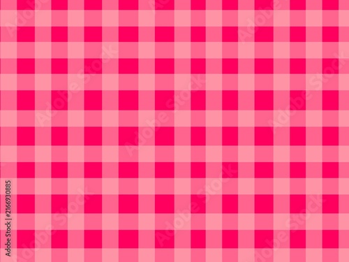 Pink gingham background. Warm cheerful plaid background. Pink checkered texture. Classic checkered textile background for picnic, fashion, and summer designs.