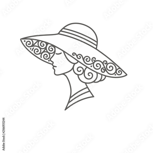 Woman in a wide-brimmed hat with ornate details