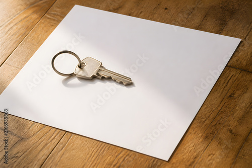House key on blank paper