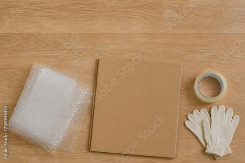 Moving packing materials flat lay
