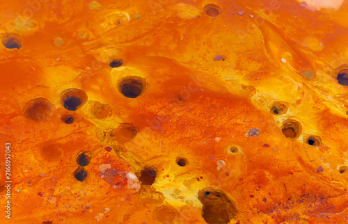 Foto Holes on the bottom of the Geamăna tailings pond, the result of violent chemical and physical processes, specific to acid mine drainage