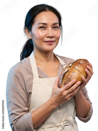Asian woman baker holding a loaf of sourdough bread isolated on a transparent background