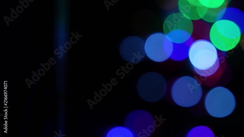 Abstract out of focus blue and green bokeh lights on a dark background with copy space, Blue and green bokeh lights on dark background