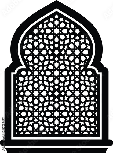 Elegant Islamic window arch with intricate arabesque and mihrab shape
