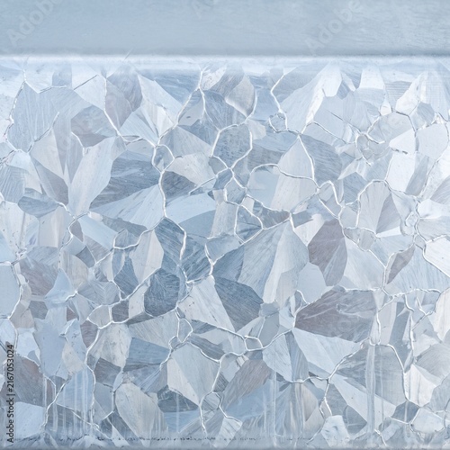 Galvanised spangle crystallising across a fresh zinc coat