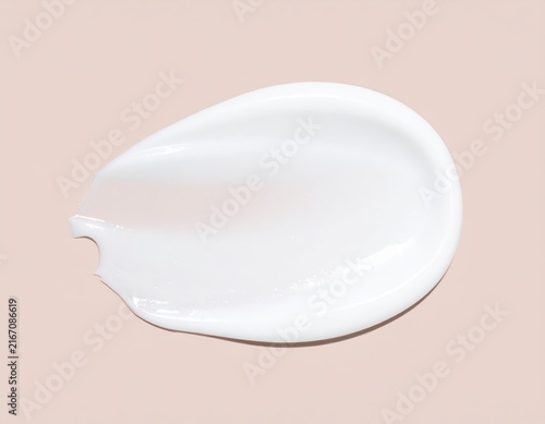 White cosmetic cream smear texture on background