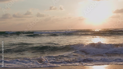 Concept of a summer beach vacation. young woman at the beach. feeling of freedom and summer rest. summer mood. moment of happiness.