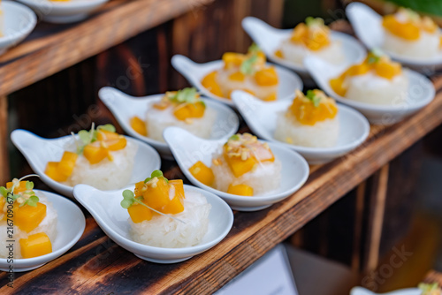 Mini Thai Mango Sticky Rice Dessert Served on Spoons