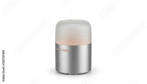 A modern cylindrical aroma diffuser emits a gentle mist against a clean white background.