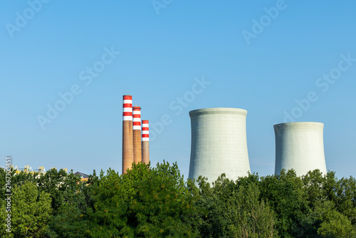 Canvastavla Power Plant Cooling Towers and Smokestacks Above Trees